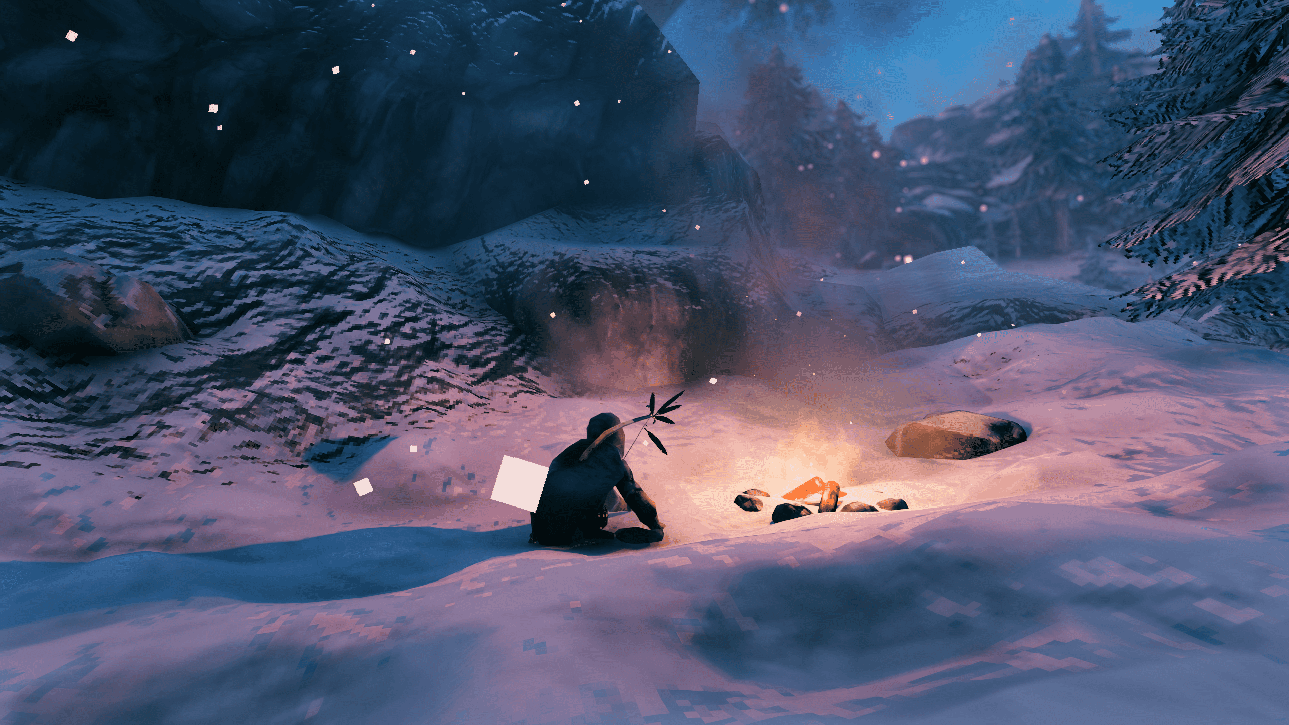 Персонаж Вальгейма, відпочиваючи біля багаття на снігу