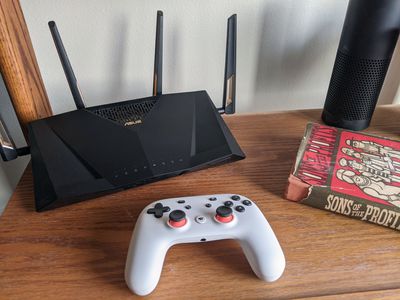 Контролер Google Stadia, розміщений близько до бездротового маршрутизатора.