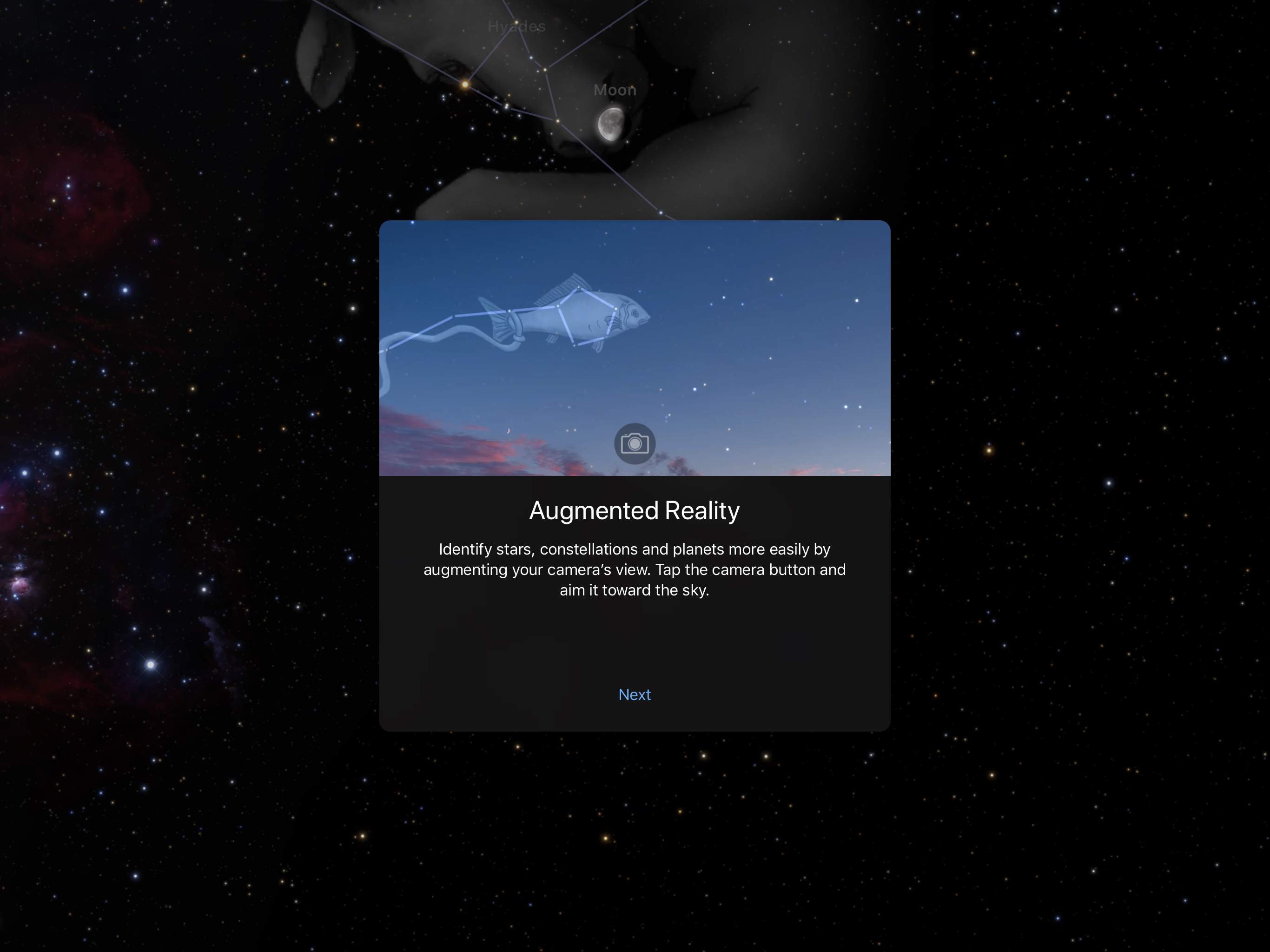 Скріншот програми Sky Guide, що показує режим доповненої реальності, який накладає зіркову карту на зображення камери